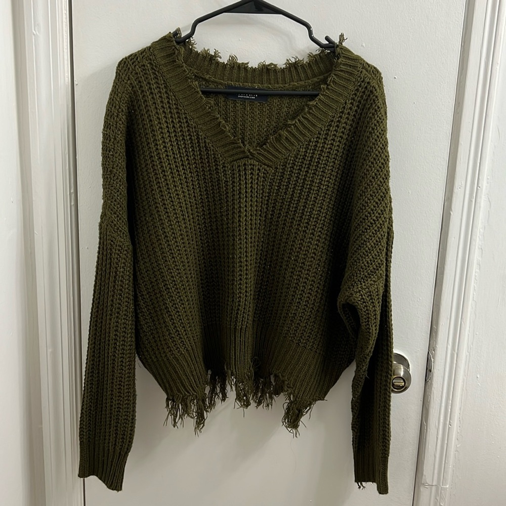Army green Akira fringe sweater.
